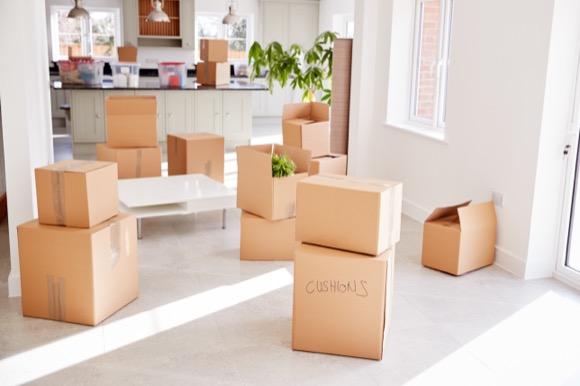 Home removals or moving home. Boxes across the floor.